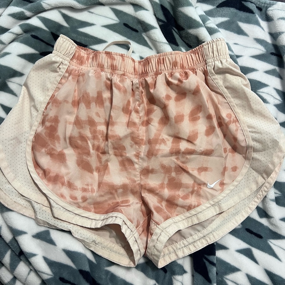 Nike Pink and Cream Athletic Shorts with Dolphin Hem